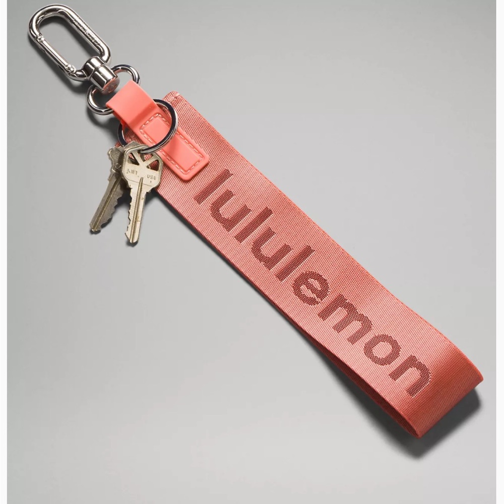 NW0T brand new lululemon Never Lost Keychain Raspberry Cream/Wine Berry